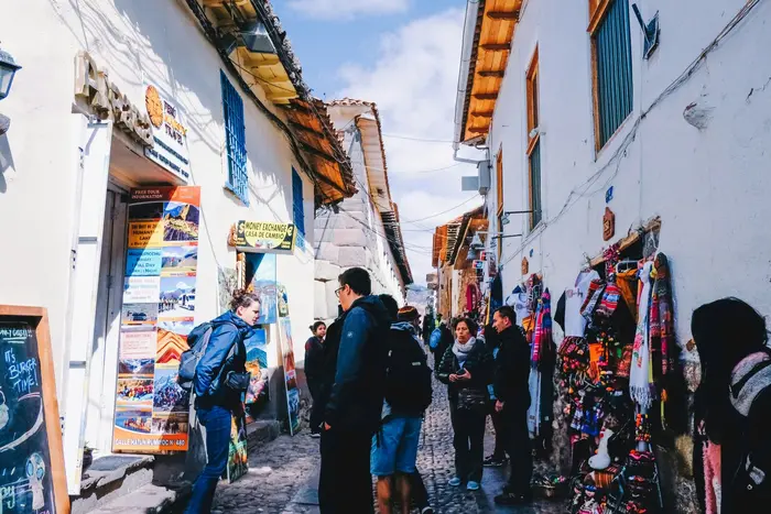A downtown street with craft shops and travel agencies