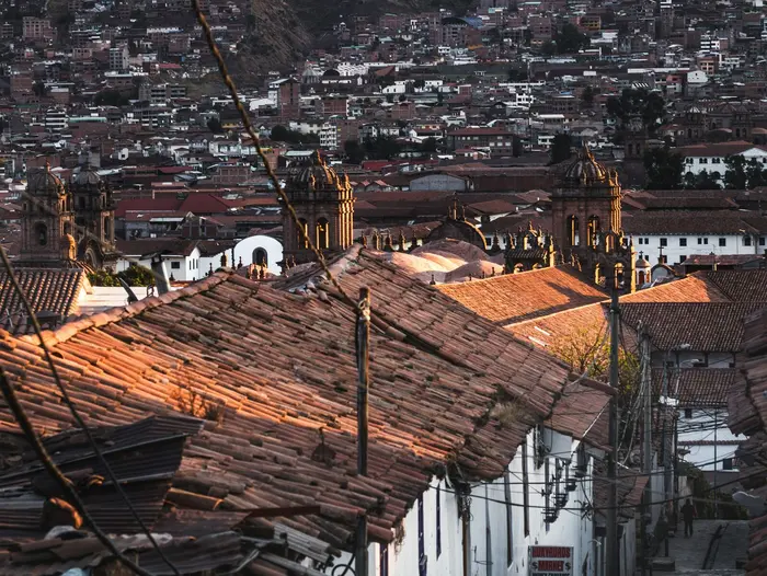 Cusco's tiled rooftops at sunset